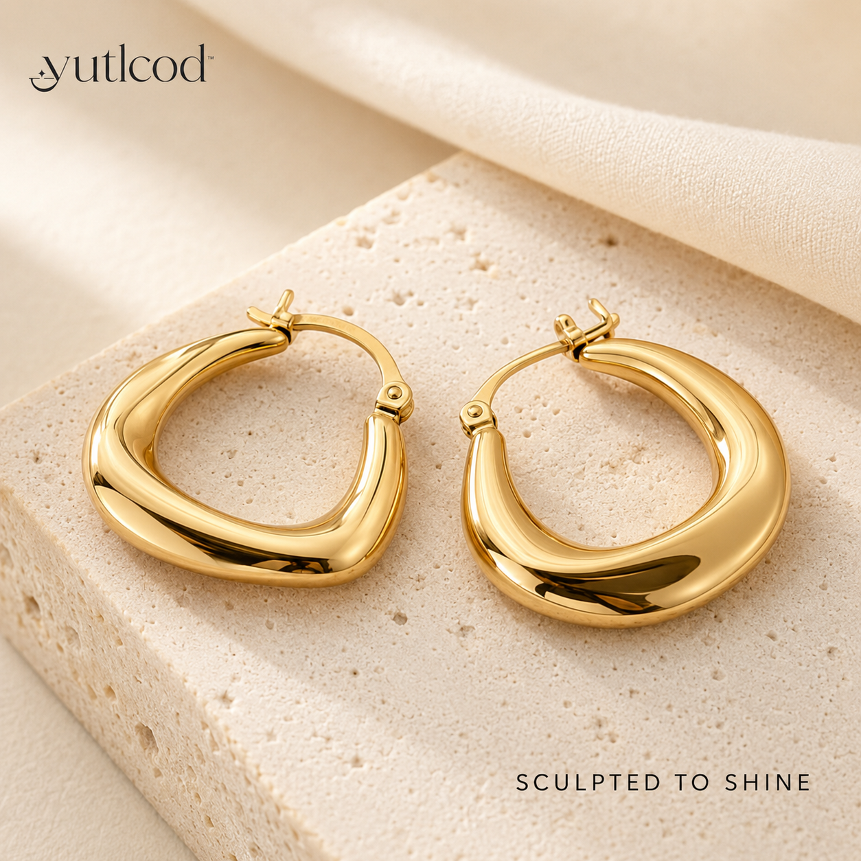 yutlcod pair of sculptural polished gold-tone hoop earrings